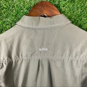 KUHL olive green, button down short sleeve shirt size Medium.